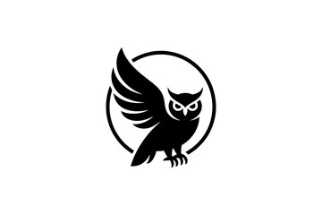 Silhouette of an owl with wings spread