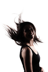 Silhouette of a young woman with long hair in the air. Isolated on white background.