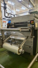 Vacuum thermoforming line in food factory