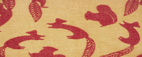 Texture, background, cotton fabric thin yellow with a print of squirrels, martens, sables. Pattern,...