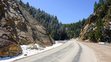 Springtime snow on Pintler Veterans Memorial Scenic Highway in mountains of Montana