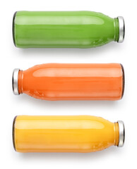 Bottles of orange, carrot  and spinach  juice isolated on white