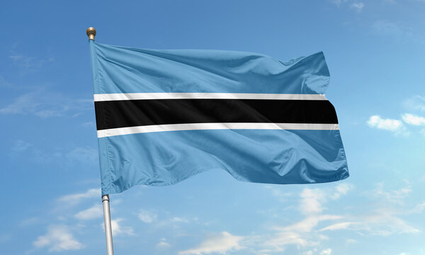 Botswana national flag waving on clear sky