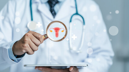 Women health check concept. doctor is holding a magnifying glass with uterus symbol to Medical check uterus female reproductive system, PCOS, ovary gynecologic and cervical cancer for Healthy feminine