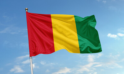 Guinea national flag waving against sky