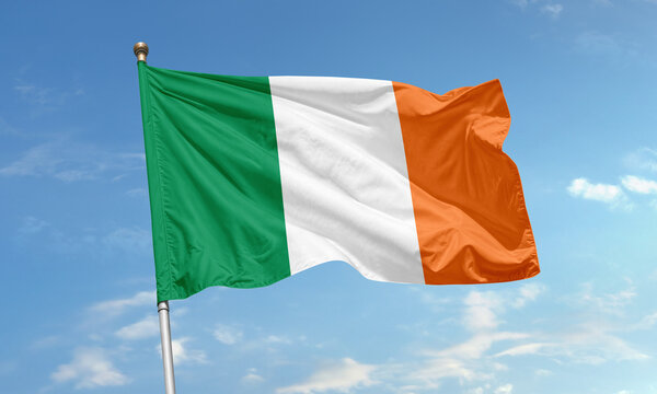 Irish national flag waving on clear day