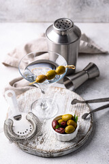 Traditional martini cocktail with olives and