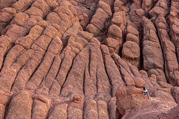 Scenic landscape of the Monkey Fingers with an unrecognizable human figure for scale, Marrakech,...