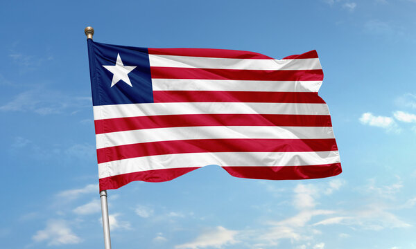 Liberian national flag waving in sky