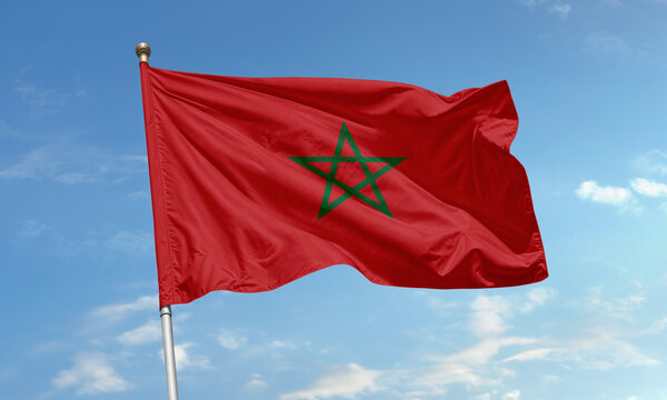 Moroccan national flag with green pentagram star flying in the wind