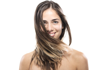 Obraz premium Studio portrait of a young woman with flowing hair, showcasing natural beauty and youthful charm