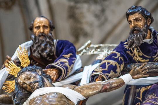 Holy Week sculpture of Nicodemus and Joseph lowering Christ in Seville
