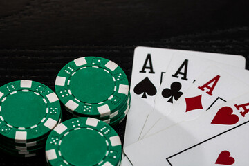 Obraz premium Casino chips and cards on the table. Gambling concept