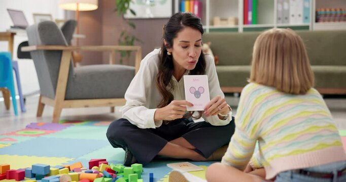Learn, psychology and speech therapy for child, help or mouse card for language development. Kid, woman and counseling session in office for pronunciation, phonics education or teach girl with autism