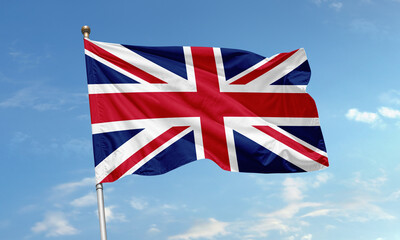 United Kingdom flag with Union Jack design waving in the sky