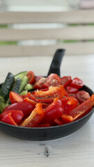 grilled vegetables on a frying pan.