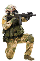 Tactical soldier posing with advanced weaponry in green camouflage gear