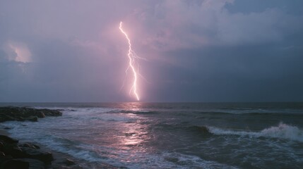A spectacular lightning strike lights up the horizon over a dark, ominous seascape, capturing nature’s raw power and beauty.