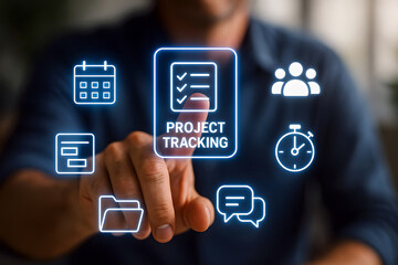 Man pressing a project tracking interface on a virtual screen.