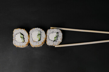 Sushi with Salmon on black Background
