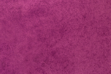 urple color backdrop: close up of canvas stained with paint