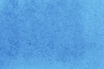 cover design backdrop: close up of canvas stained with blue color paint