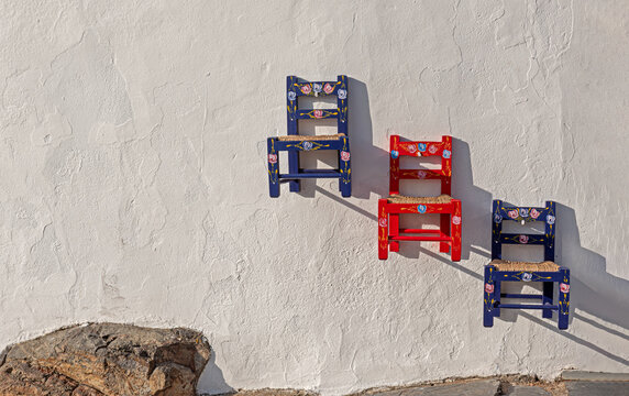 Typical Andalusian chairs, color and tradition in Seville, Spain