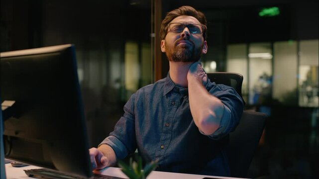 Caucasian man businessman business entrepreneur sedentary computer work syndrome neck ache cervical pain sick tired overworked male guy workaholic discomfort hurt health problem injury in night office