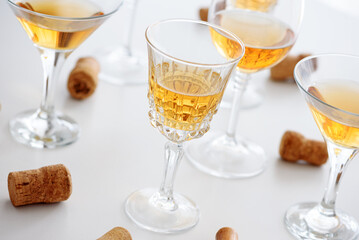 Set of glasses of yellow wine at wine tasting