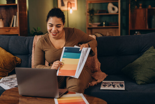 African American woman designer offers creative ideas for new collection to executive director