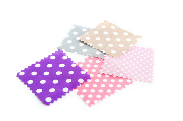 Samples of fabrics with polka dot pattern isolated on white