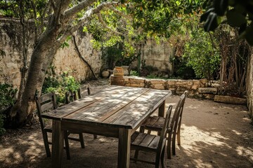 Rustic outdoor dining area under a tree