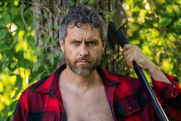 Brutal lumberjack. Brutality and masculinity. Hispanic lumberjack man with axe. Lumberjack axe. Man...