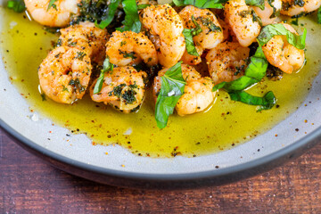 Jumbo Shrimp Scampi Sauteeing in Butter and Olive Oi