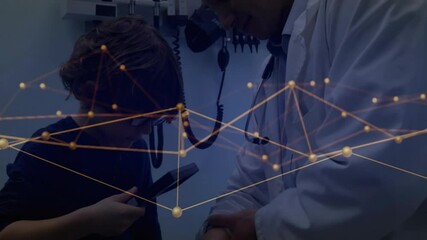 Doctor guiding child squeezing cuff inflation then child lifting otoscope for ear exam in clinic - Powered by Adobe