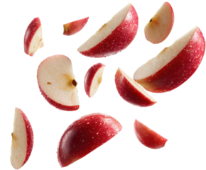Sliced red apple pieces falling in air food dynamic viewpoint isolated on transparent background