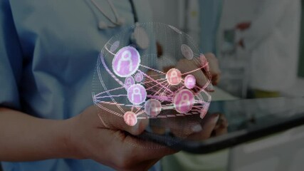 Medical professional holding tablet tilting revealing rotating network sphere for patient data - Powered by Adobe