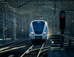A commuter train running on the tracks