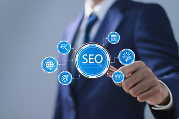 Businessman analyze SEO search engine optimization for promoting ranking traffic on website and optimizing your website to rank in search engines.