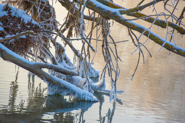 Experience the awe-inspiring beauty of the frozen river at sunrise. Witness the breathtaking spectacle of nature unfolding before your eyes. Be enchanted by the shimmering frost
