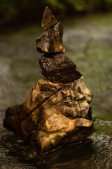 stone balancing in river