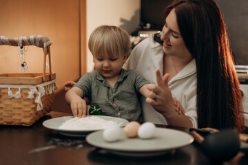 Easter kitchen fun with mom and toddler creating holiday crafts through messy play gentle parenting and mindful bonding making sweet spring memories with flour eggs and lots of laughter together