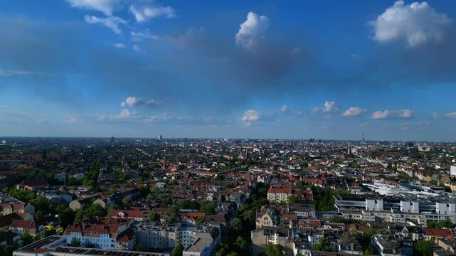 Rescue helicopter landing in Berlin urban park. Best aerial view flight drone