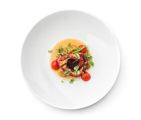 Grilled octopus with vegetables and sauce in plate isolated on white background. Healthy food, top view, close up