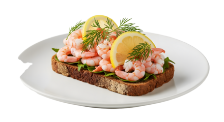 Shrimp open sandwich with lemon and dill on a plate