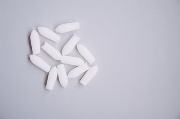 Pills on light background. Medicine theme.