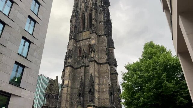 Hamburg, Germany - May 20: The Gothic Church of St. Nicholas in Hamburg, Germany. This church was destroyed while second world war. Memorial and an important architectural landmark. Church Tower