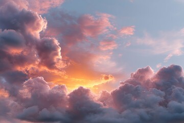 Clouds illuminated by sunset showing shades of orange pink and grey in a pale blue sky