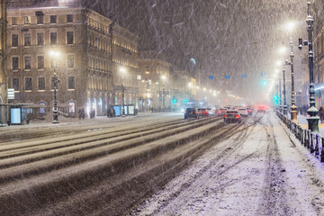 City street of the historical center at snowfall time.