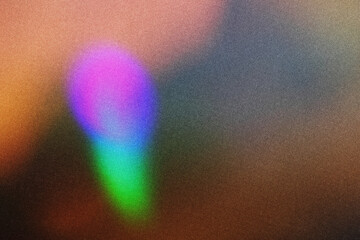Blur colorful rainbow crystal light leaks on black background. Defocused abstract multicolored...